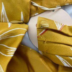 Antonia Mini Dress in Gold Tropical
Camila Coelho